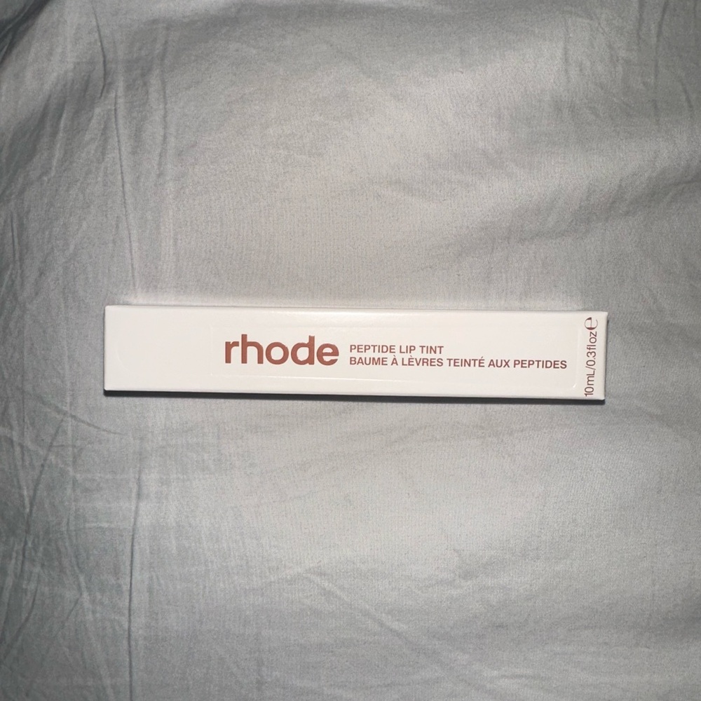 Brand new Rhode limited edition “Cinnamon Roll” peptide lip tint